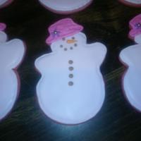 Pink Snowman its hard to tell, but the cookies are pink, with light pink royal icing to flood, light brown for buttons on snowman. made these for my...