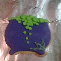 Cauldron Well the color is off again, darn phone camera, hehe! It's actually a purple, it looks blue tho. Its all royal icing. TFL!
