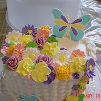 Course Ii Cake I was very satisfied with the out come of the basket weave and the royal icing flowers.