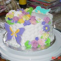 May24_Class_Cake_027.jpg My sister and I both took this class together and had a blast. This is my class 2 final cake. I am very pleased with it.