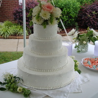 Wedding Cake This was my second wedding cake. Simple cake... white cake with buttercream icing