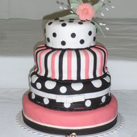 Round Wedding Cake My first wedding cake that was covered in fondant. I learned a lot from this cake!