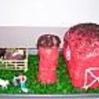Barnyard I made this cake for my son's 4th Birthday that was Barnyard themed. The barn is 2 loaf cakes stacked on top of each other. The Silo...