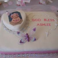 Ashlee's Baptism Cake - 2006 They didn't get a full picture of the decorations around the cake but you can see the full cake itself.