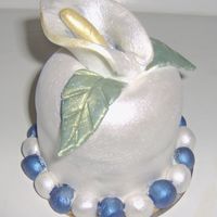 Mini1 mini cake covered with fondant then painted with luster dust