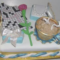 Cross Word Puzzle Cake Crossword puzzle cake, Tiffany pearls and gift box, rose all hand painted and made out of fondant on a tray.