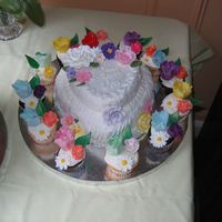 Small Cake And Cupcakes this was a pound cake that i made so they could have a cake for their 1st anniversary. i also had extra cupcakes from the cupcake tree and...