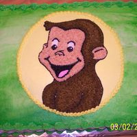 Curious George Curious george cake, iced all in buttercream. I made the circle by tracing a plate and my son in law drew the George for me to transfer...
