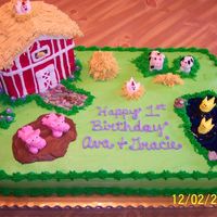 Barnyard Birthday Cake I decorated this for a friend's twin girls. The barn is made out of cake and all the animals are made from buttercream and fondant....