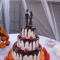 Day Of The Dead Wedding Cake Bride and groom wanted a day of the dead celebration without being gruesom the cake is 14" white with 10" chocolate and toped...