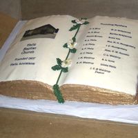 Hbc 100-Year Anniversary Cake Half-chocolate, half-butter cake with buttercream dream and royal icing dogwoods.