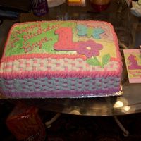 1St Birthday Cake for my cousin's first birthday to match invitation. Inside of cake was pink and white with strawberry filling. It was a total of...