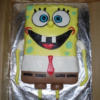 Spongebob This is a chocolate fudge cake with buttercream frosting and MMF. The whole cake is edible including the candy stick legs.
