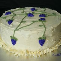 Grapes On The Vine 8" Lemon cake with lemon curd/BC center. Idea from the Wilton Course 1 book. I always liked the look of the cake. It looks okay but I...