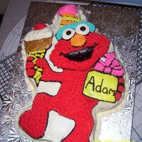 Elmo This was my first charecter cake! I never thought there would be so much work to one of these, but it turned out pretty good!
