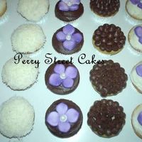 Mini Cupcakes 300 mini cupcakes for a wedding today - my hands hurt. The flowers are fondant hygrangeas (matching the brides flower theme)Coconut cake,...