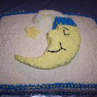 100_1646.jpg I made this for my sister-n-law's baby shower. I used a sheet cake and a 10 in round for the moon. I used fondant for the star....