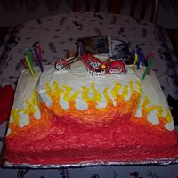 American Chopper For my son's 8th birthday he wanted a American Chopper theme. His cake had to have flames and a chopper. I used a sheet cake pan and a...