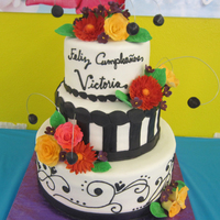 Victoria's 80Th Birthday Cake Gumpaste flowers, red velvet cake. My first attempt at gerber daisies!
