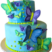 Katherine's 10Th Bday Butterflies were formed out of gumpaste with a cutter and painted freehand. I marbled the fondant the get a swirly effect.