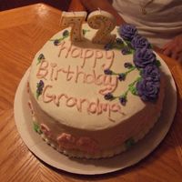 My Grandma's Birthday Cake Chocolate cake with vanilla pudding in the middle covered in buttercream frosting:) mmm yum