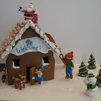 Rudolph And Friends With Habitat For Humanity This was made for a Habitat for Humanity auction. I made a scene of Rudolph the Red-nosed Reindeer and his friends building a Habitat house...