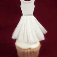 Paper Dress Cupcake Topper I made 36 of these dresses for a bridal shower. i originally made them last year for my daughter's ballet party (to look like tutus)....
