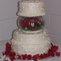 Cake1.jpg My 1st wedding cake. And they only gave me a 3 day notice. It;s not great but it's ok . ( I think??????)