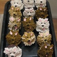 Cupcake Dogs I used two chocolate cupcakes for this. A smalller cupcake for the head and a larger one for the body. The design came from the book Hello...