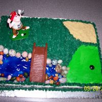 Golf B-Day Cake Maple walnut with apple filling and bc icing. made for a golf nut. everything edible except the bridge and golfer