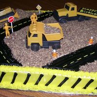 Road Work The cake was half yellow and half chocolate with vanilla buttercream. I used crushed golden Oreos (with chocolate creme) for the gravel and...