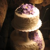 Third Course Wilton Wedding Cake This is a more romantic view of the cake. Looks better in this light without a flash!