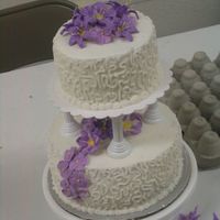 Third Course Wedding Case This is my Wilton third course wedding cake. Bottom is lopsided cause it dropped, but I tried to fix it. I did royal icing flowers. My...