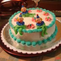 Clown Cake-Wilton Class My second cake. I wasn't too fond of the clowns, and they half melted on the way home. My son loved it though.