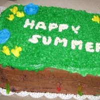 Happy Summer For a Grade 4 class. As you can see, it moved on the cake board, but oh well. It is a double-layer 9 by 13 white cake. The mud is chocolate...