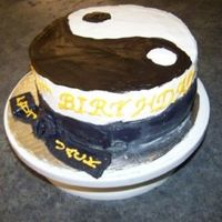 Black Belt This is a chocolate cake with MMF black belt around it. It was made for my godson who just earned his first degree black belt at the age of...