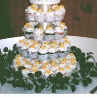 50Th Anniversary Cake My attempt at a cupcake cake with stand. I made the stand(thaks for the ideas from this site). My parents were very pleased with it