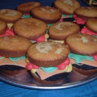 Hamburger Cupcakes I made these for my son's daycare. I got the idea from CC. Yellow cake/Chocolate cake/BC icing/MMF. They were alot of fun to make &amp...