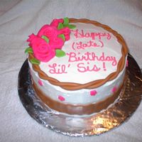 My Sisters Late Birthday Cake Devil's Food cake, cookies and cream filling, Vanilla Butternut BC with fondant accents. I got a little more creative with the cake...