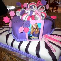 My Niece's Ninth Birthday Cake Wow did this take me forever! Yellow 1/2 sheet cake with raspberry buttercream, Devil's food heart shape cake with Mocha cream filling...