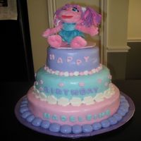 Abby Cadabby 3 tier chocolate, vanilla, chocolate with rolled buttercream frosting and decorations