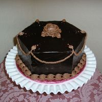 Ganache Hexagon This is vanilla cake with chocolate mousse filling with raspberry, chocolate icing and ganache over that. It didn't turn out at all...