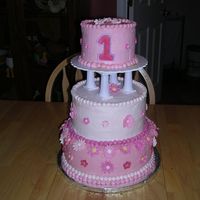 1St Birthday Cake I made this cake for my daughter's first birthday- making a tiered/stacked cake with the top tier just for her! Buttercream icing-...