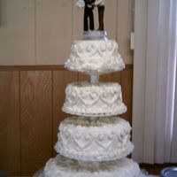 Wedding Cake Law Enforcement This wedding cake was a pleasure to do. The bride and groom requested no flowers on the cake. It was decorated using only tips 18 & 22...