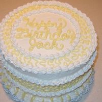 Cornelli Ribbon A dark chocolate fudge cake made with Ghiradelli cocoa (yum!) and whipped cream bc icing. This is the icing that I added violet to in order...