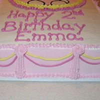 Hello Kitty - Side View Just a side view on the Hello Kitty cake. Note to self--I will NEVER use a 10 x 14 board for a 13 x 9" cake! It's just TOO close...