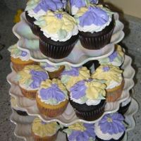 Pansy Cupcakes Chocolate and vanilla cupcakes decorated with pansies.