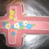 Christening Cake For Baby Girl A lemon cake with lemon curd filling, buttercream frosting and royal icing flowers. It's a small cake made using the Wilton Cross pan...