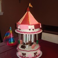 Carousel Birthday Cake Cake for my daughter's 3rd birthday. Buttercream with fondant and royal accents. Animals are molded Wilton melts. Had some logistics...