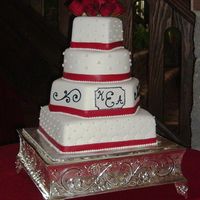 Multi-Shaped Tier Stacked Cake (Krystle's Cake) Four tier multi-shaped stacked cake. 4" square on 8" round on 12" hexagon on 12" square. All covered in white rolled...